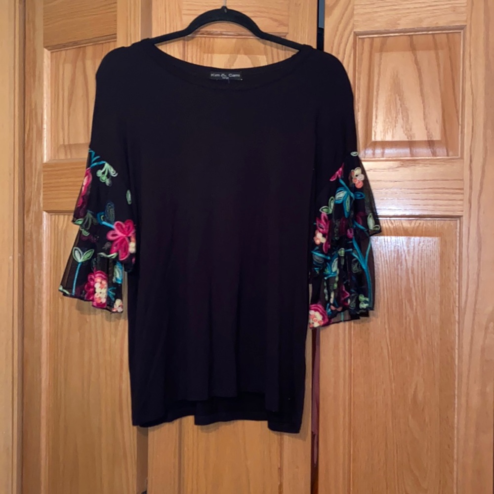 Black blouse with floral detailed sleeves